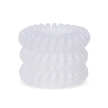 Load image into Gallery viewer, A tower of 3 ice white coloured hair bobbles called spirabobbles. A white plastic spiral circular hair tie spira bobble.
