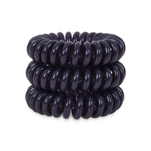 Load image into Gallery viewer, A tower of 3 navy blue coloured hair bobbles called spirabobbles. A plastic spiral circular hair tie spira bobble.
