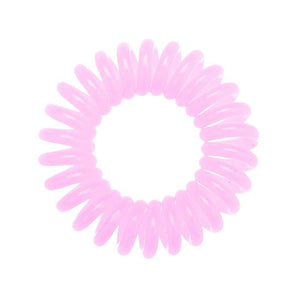 A pink coloured plastic spiral circular hair bobble on a white background called a spirabobble.