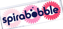 Load image into Gallery viewer, A flat transparent box of 3 pretty in pink coloured hair accessories called spirabobbles
