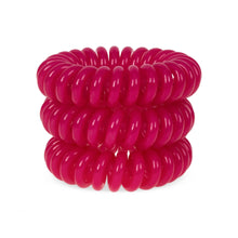 Load image into Gallery viewer, A tower of 3 rose pink coloured hair bobbles called spirabobbles. A plastic spiral circular hair tie spira bobble.
