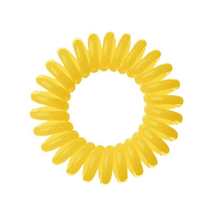 A sunflower yellow coloured plastic spiral circular hair bobble on a white background called a spirabobble.