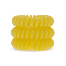 Load image into Gallery viewer, A tower of 3 sunflower yellow coloured hair bobbles called spirabobbles. A plastic spiral circular hair tie spira bobble.
